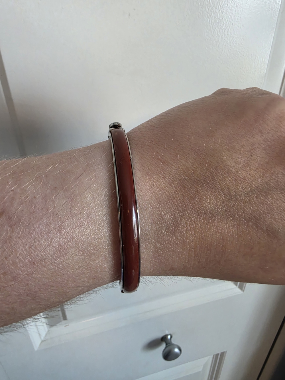 Fossil earthy red or deep copper color Resin/enamel hinged Bangle